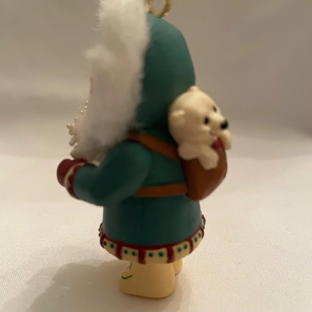 Hallmark Ornament - Girl in Teal and White with Red Accents. EUC in original box